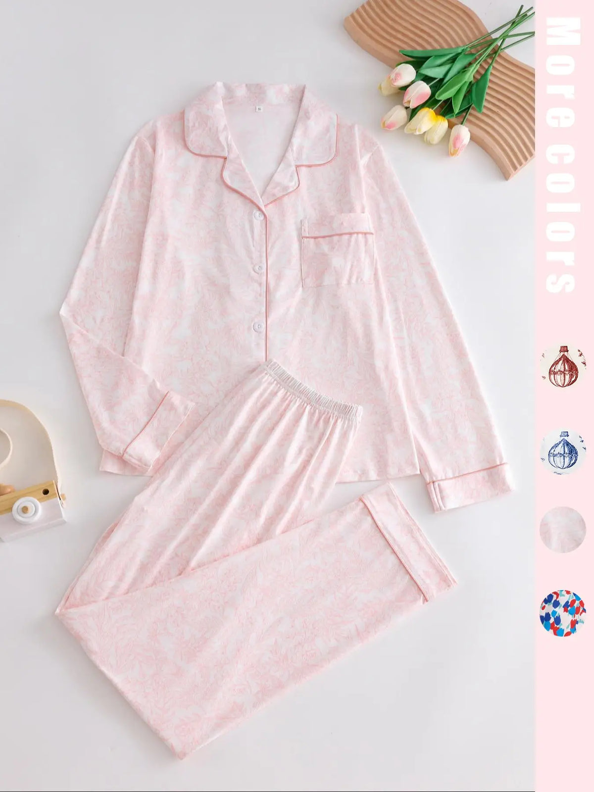 Two-piece pink ladies' pajama set with full-color prints. Button-front collar shirt and elastic waist pants pajama. Casual and comfortable collar long-sleeved top and long pants pajama set. Ladies' pajamas for spring and autumn Loungewear.