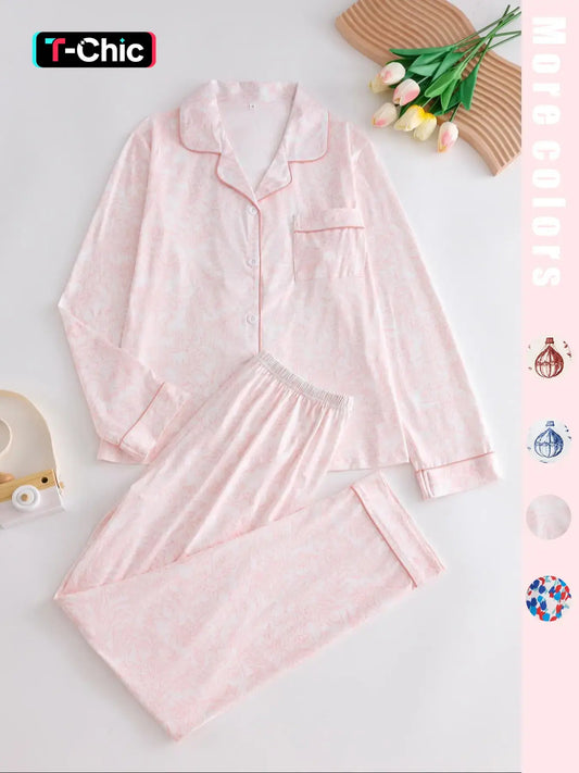 Two-piece pink ladies' pajama set with full-color prints. Button-front collar shirt and elastic waist pants pajama. Casual and comfortable collar long-sleeved top and long pants pajama set. Ladies' pajamas for spring and autumn Loungewear.